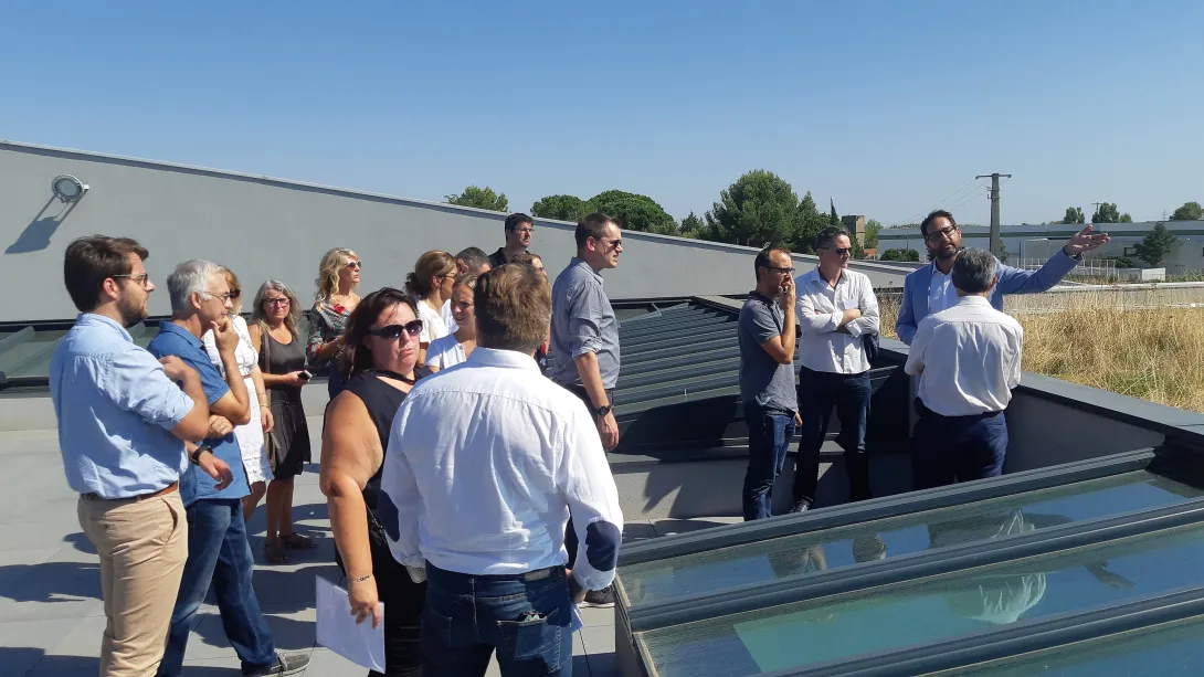 Visite du bâtiment à énergie positive de la société Quadran Energie en présence de Christine Bel, architecte